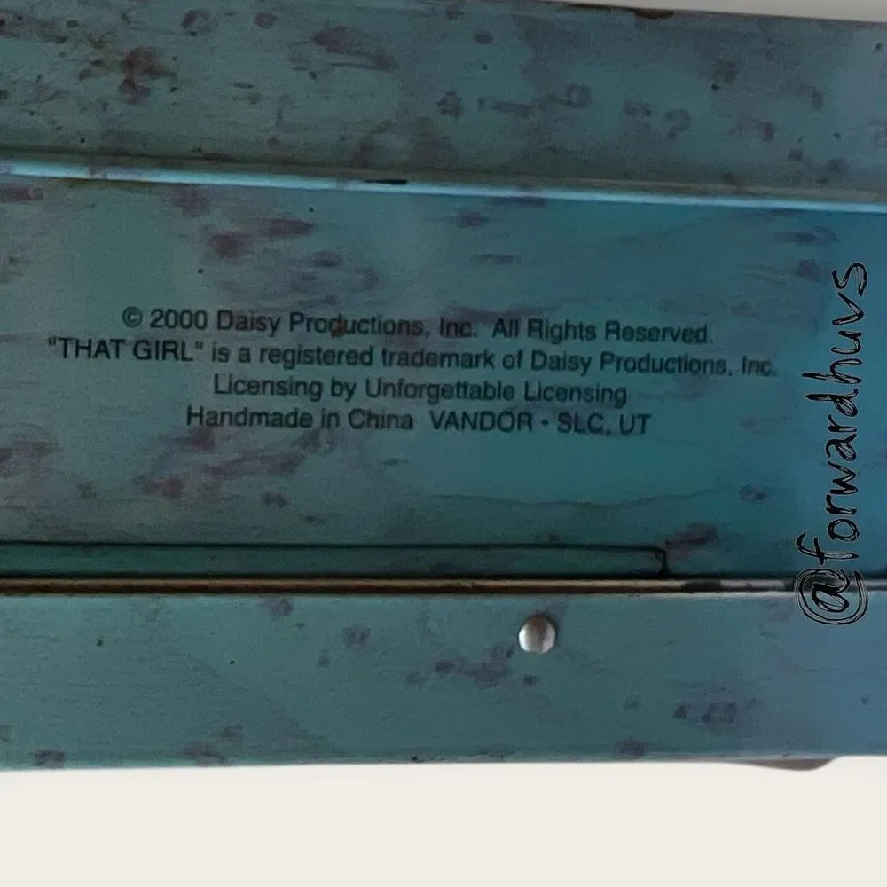 Daisy Productions metal collectible